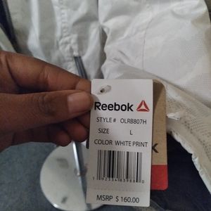 White reebok coat